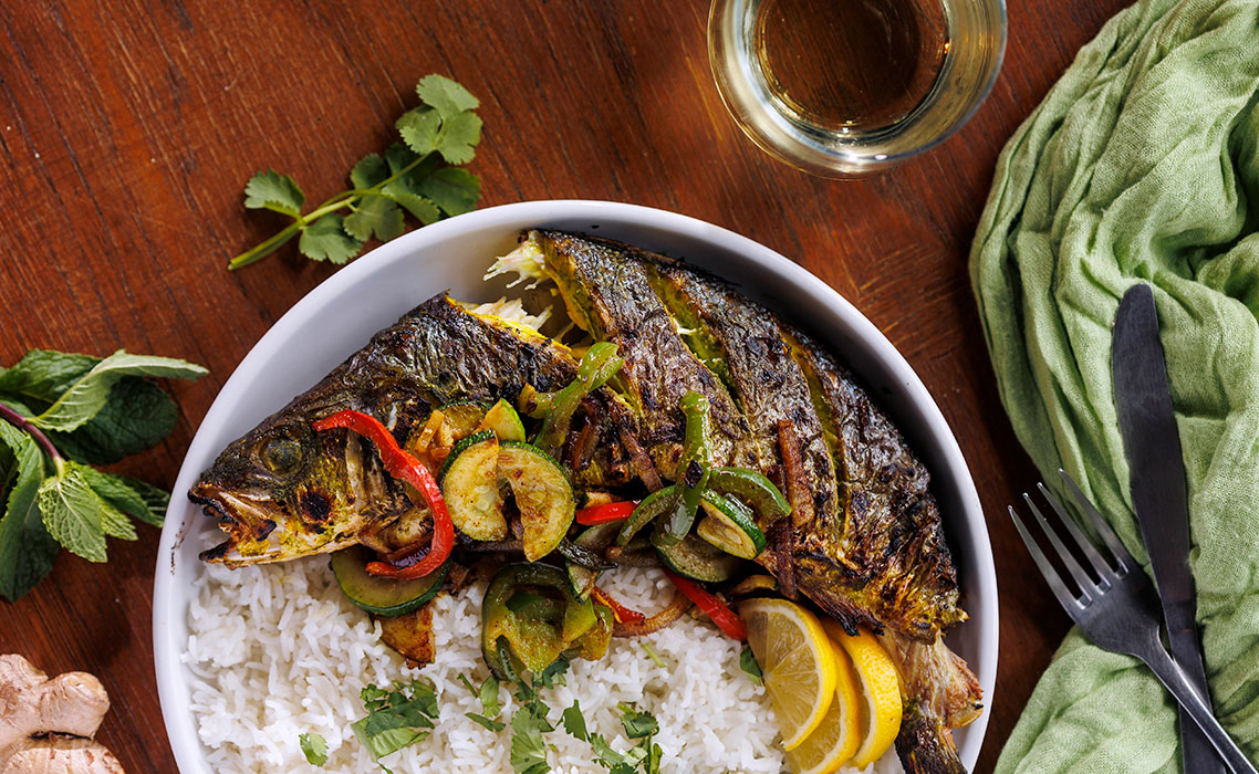 Hariyali whole fish, a signature dinner dish