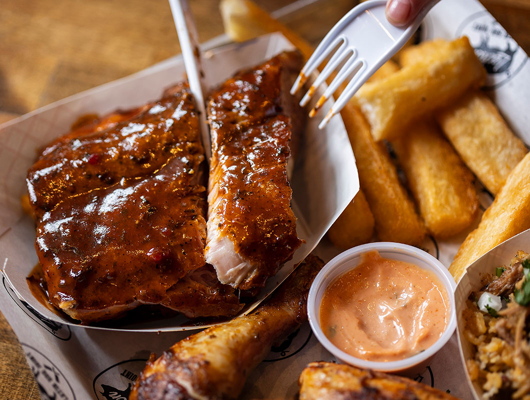 Tender pork ribs with jerk sauce pair perfectly with the KM dipping sauce, a garlicky mix of ketchup, mayonnaise, and spices.