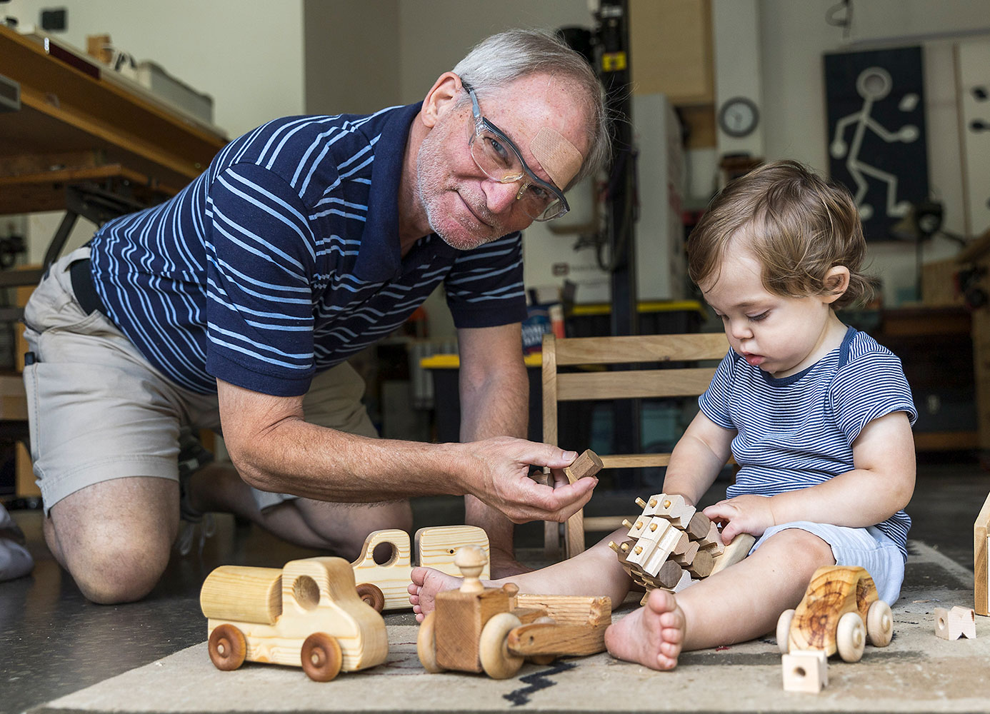 Roy Brookhart puts his toys to the test with his 1-year-old grandson, Dylan.